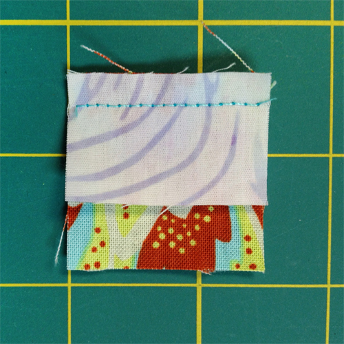 QM Bitty Blocks: August Log Cabin | Quilting Daily