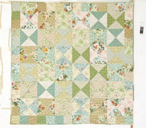 Cottage Whispers quilt pattern for precut fabric