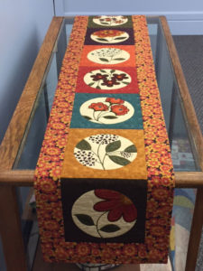 creative uses for fabric panels essence table runner 225x300 Off the Wall: Creative Uses for Fabric Panels