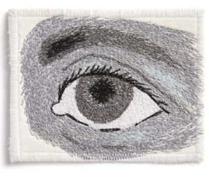 Thread sketched eye in black and white