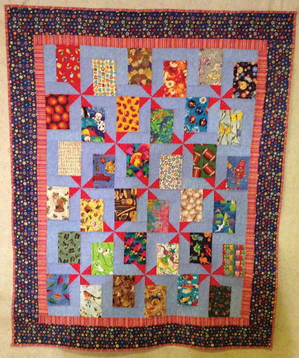  Soft & Rosey recreated as an I Spy quilt by Nann Hilyard from Quick Quilts, Dec/Jan 2014